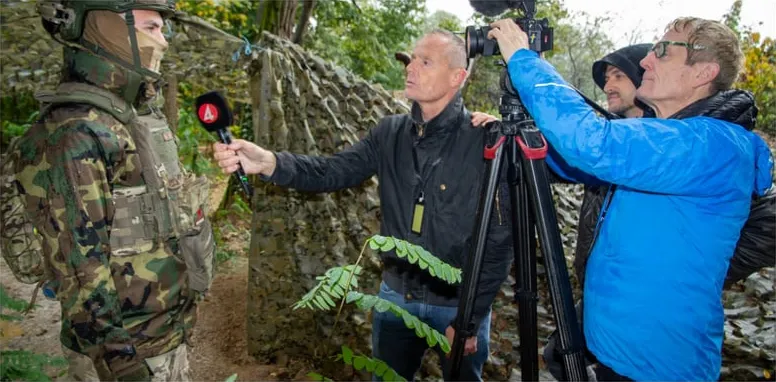 Interviewing a soldier
